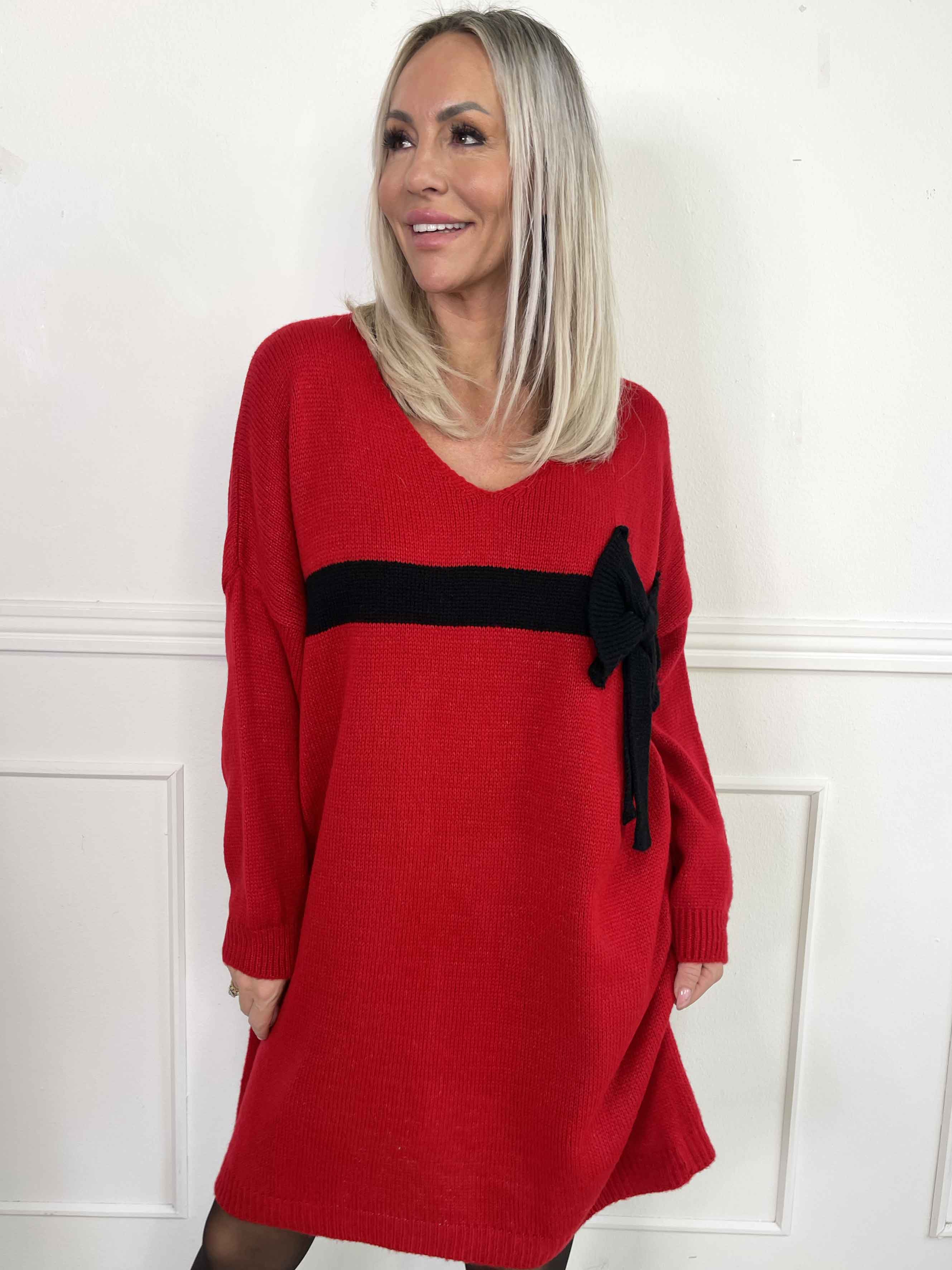 Berra - Stickad klänning med band och rosett